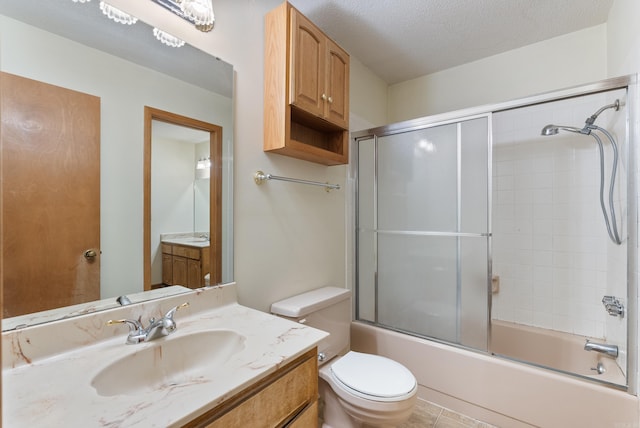 101 Winchester Ct, Fairfield Bay, AR 72088 - full bath with vanity, combined bath / shower with glass door, and a textured ceiling