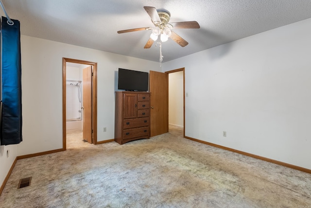 101 Winchester Ct, Fairfield Bay, AR 72088 - unfurnished bedroom featuring carpet floors, a ceiling fan, and connected bathroom