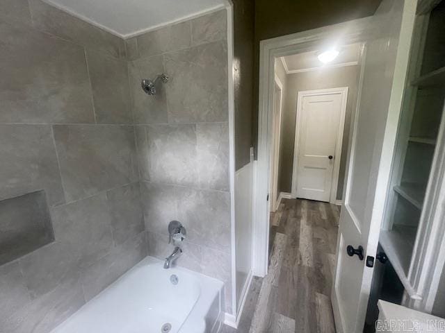 741 Macarthur Ave, Wake Village, TX 75501 - full bath with wood finished floors, tub / shower combination, and crown molding