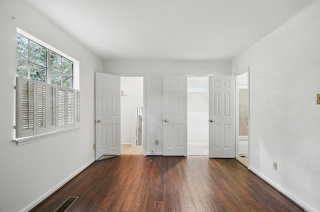 49 Kingsbridge Way, Little Rock, AR 72212 - unfurnished bedroom with wood finished floors and baseboards