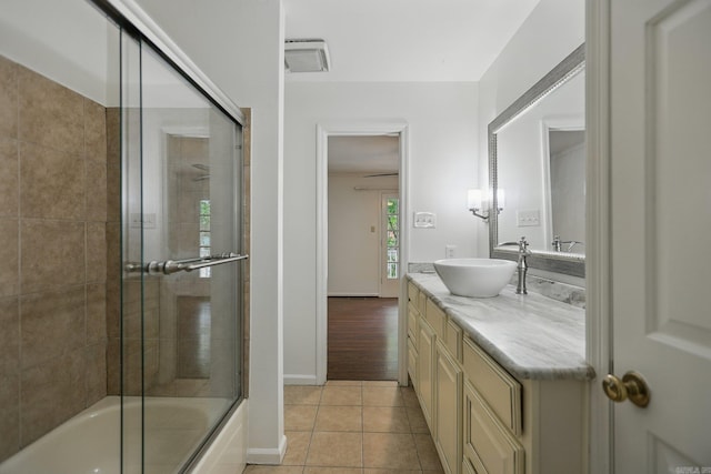 49 Kingsbridge Way, Little Rock, AR 72212 - bathroom featuring vanity, tile patterned floors, and enclosed tub / shower combo
