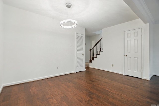 49 Kingsbridge Way, Little Rock, AR 72212 - unfurnished living room featuring dark wood finished floors and stairway