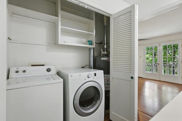 49 Kingsbridge Way, Little Rock, AR 72212 - laundry area featuring washer and clothes dryer and hardwood / wood-style floors