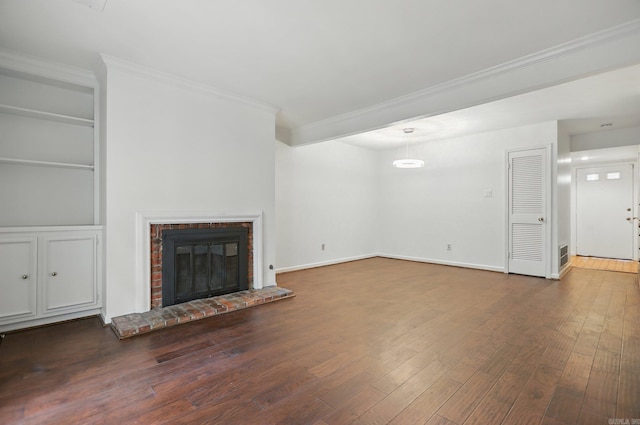 49 Kingsbridge Way, Little Rock, AR 72212 - unfurnished living room featuring wood finished floors, ornamental molding, and a fireplace