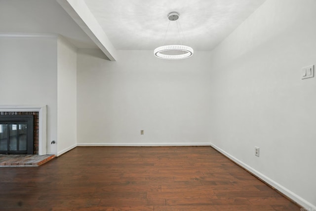 49 Kingsbridge Way, Little Rock, AR 72212 - unfurnished living room featuring wood finished floors and a fireplace
