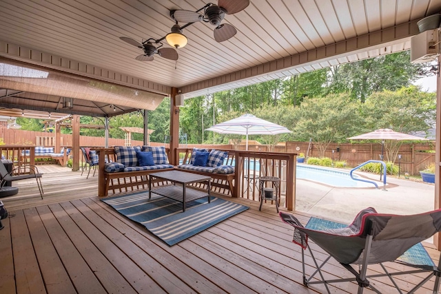 6708 Austin Harbor Loop, Sherwood, AR 72120 - wooden deck featuring a fenced backyard, an outdoor hangout area, and a ceiling fan