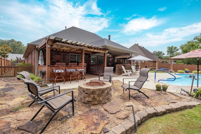 6708 Austin Harbor Loop, Sherwood, AR 72120 - fenced backyard with a fire pit, a pergola, and a patio