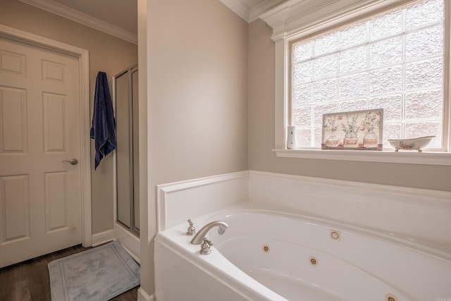 6708 Austin Harbor Loop, Sherwood, AR 72120 - full bathroom featuring a jetted tub, plenty of natural light, crown molding, a stall shower, and wood finished floors