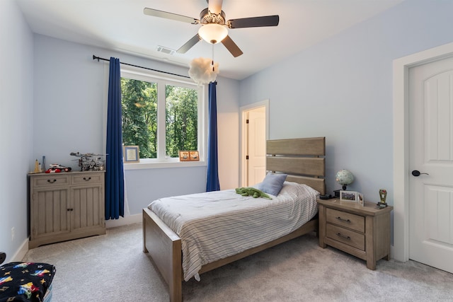 18001 Oak Creek Pl, Little Rock, AR 72223 - bedroom featuring light carpet and a ceiling fan