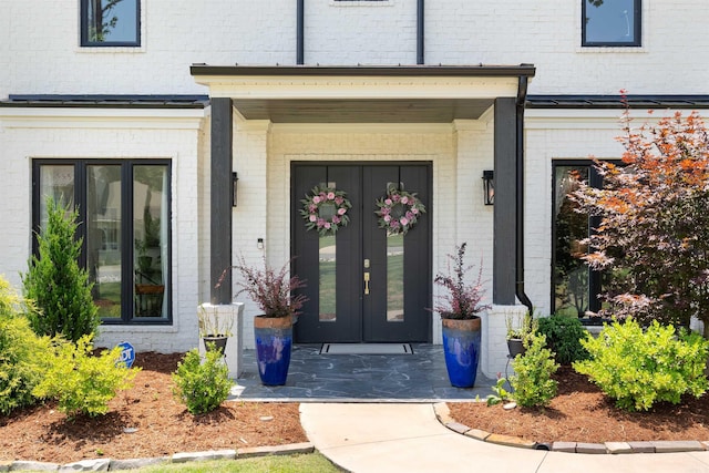 18001 Oak Creek Pl, Little Rock, AR 72223 - property entrance with brick siding and french doors