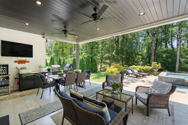18001 Oak Creek Pl, Little Rock, AR 72223 - view of patio / terrace featuring a jacuzzi, ceiling fan, outdoor dining space, an outdoor hangout area, and view of wooded area