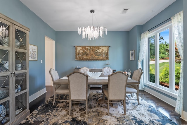 18001 Oak Creek Pl, Little Rock, AR 72223 - dining space featuring a chandelier and wood finished floors