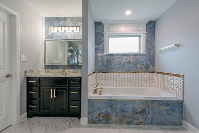 1027 Evening Sunset Cir, Redfield, AR 72132 - bathroom with vanity, marble finish floors, and a garden tub