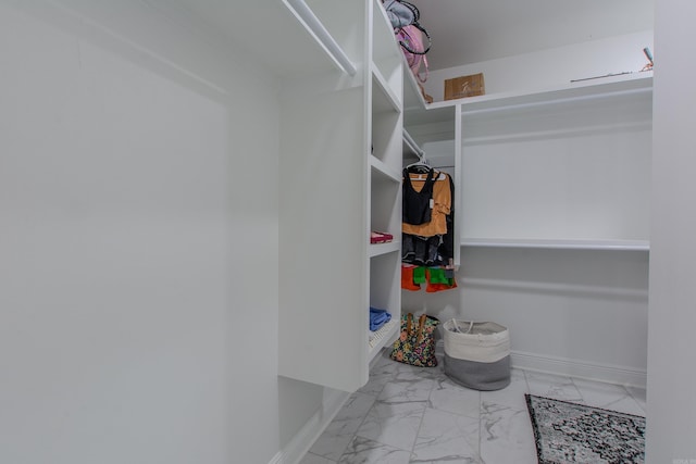 1027 Evening Sunset Cir, Redfield, AR 72132 - walk in closet with marble finish floors