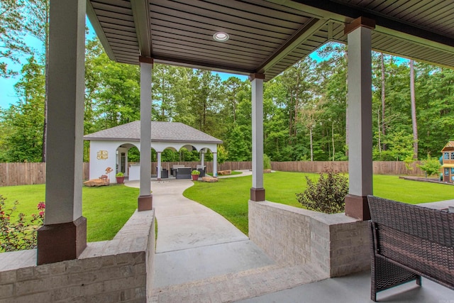 1027 Evening Sunset Cir, Redfield, AR 72132 - fenced backyard featuring a gazebo, a patio area, and an outdoor living space