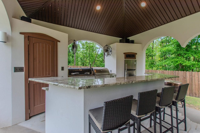 1027 Evening Sunset Cir, Redfield, AR 72132 - view of patio / terrace featuring an outdoor kitchen