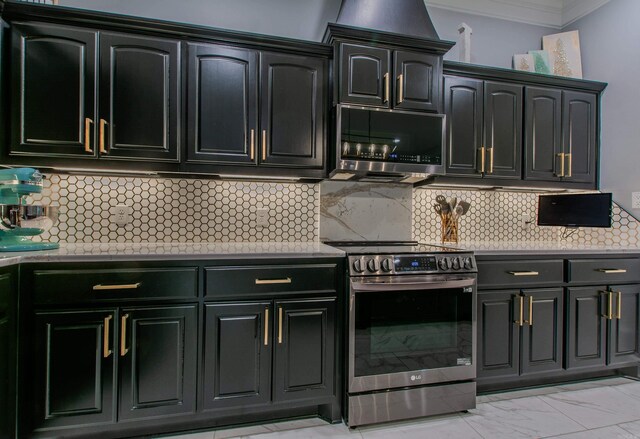 1027 Evening Sunset Cir, Redfield, AR 72132 - kitchen with appliances with stainless steel finishes, ornamental molding, light marble finish floors, dark cabinets, and light countertops