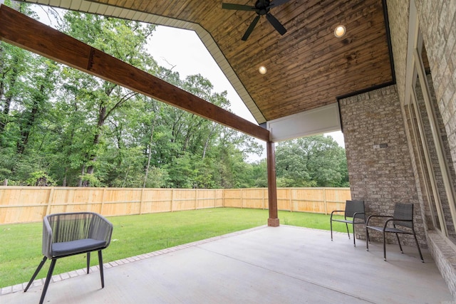 14408 Stonebrook Ln, Maumelle, AR 72113 - fenced backyard featuring a ceiling fan and a patio