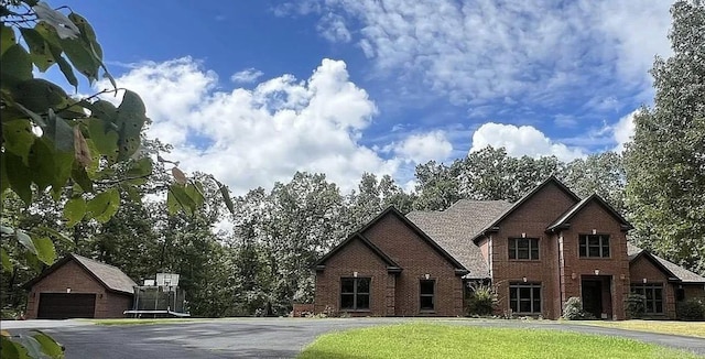 847 Woodland Hills Dr, Mountain View, AR 72560 - view of front of property with brick siding and a garage