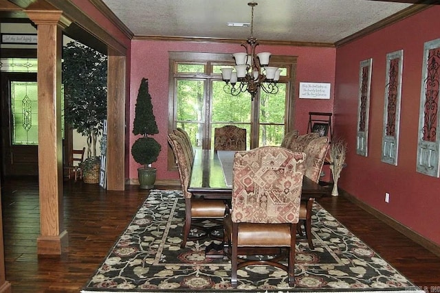 847 Woodland Hills Dr, Mountain View, AR 72560 - dining area featuring dark wood-style flooring, a chandelier, crown molding, and a textured ceiling