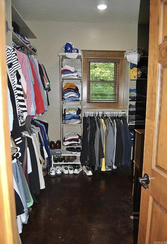 847 Woodland Hills Dr, Mountain View, AR 72560 - walk in closet with wood finished floors