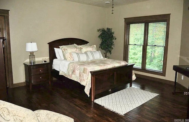 847 Woodland Hills Dr, Mountain View, AR 72560 - bedroom featuring wood finished floors and multiple windows