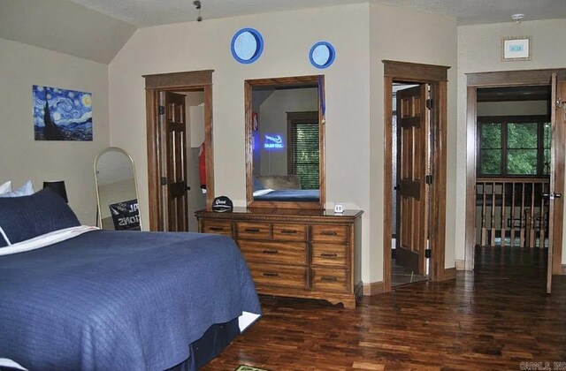 847 Woodland Hills Dr, Mountain View, AR 72560 - bedroom with wood finished floors and lofted ceiling