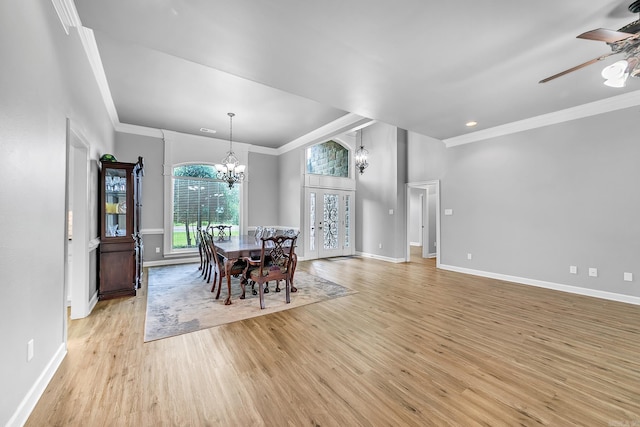 706 Greystone Blvd, Cabot, AR 72023 - dining space with a chandelier, crown molding, light wood-style floors, and ceiling fan