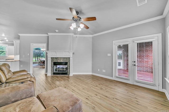 706 Greystone Blvd, Cabot, AR 72023 - living area with french doors, a ceiling fan, light wood-style flooring, crown molding, and recessed lighting