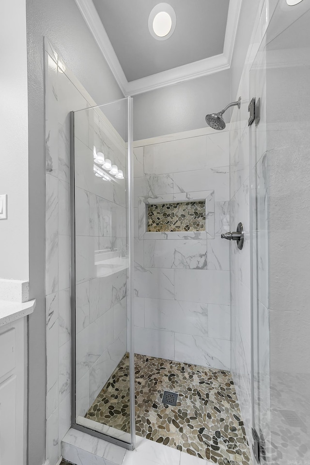 706 Greystone Blvd, Cabot, AR 72023 - bathroom with ornamental molding, a marble finish shower, and vanity