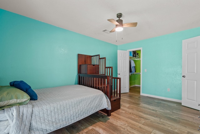 175 Appaloosa Trl, Hot Springs, AR 71909 - bedroom featuring wood finished floors and a ceiling fan