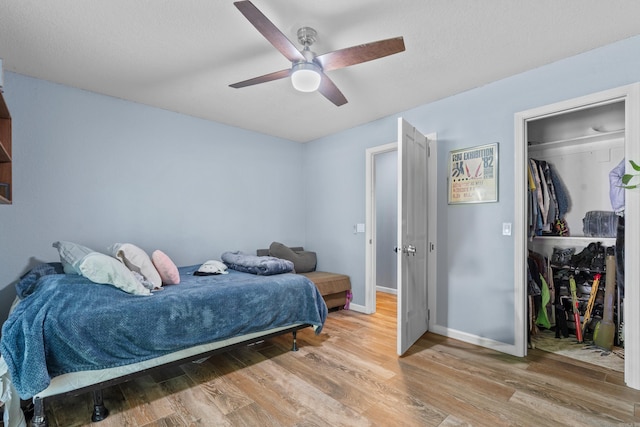 175 Appaloosa Trl, Hot Springs, AR 71909 - bedroom with light wood-style floors, a closet, and a ceiling fan