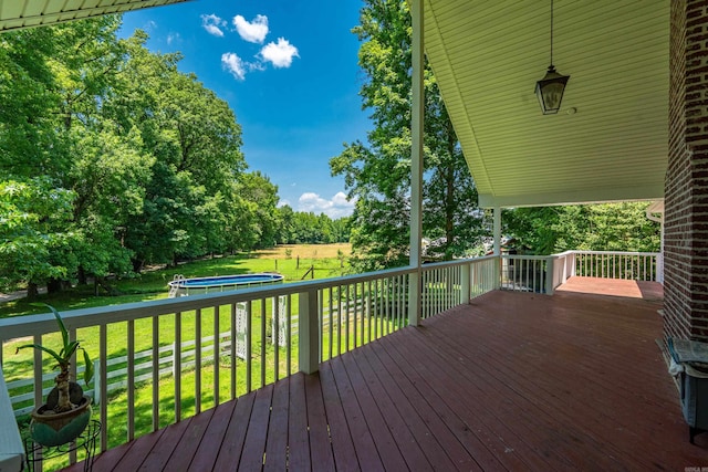 175 Appaloosa Trl, Hot Springs, AR 71909 - wooden deck featuring a yard and view of scattered trees