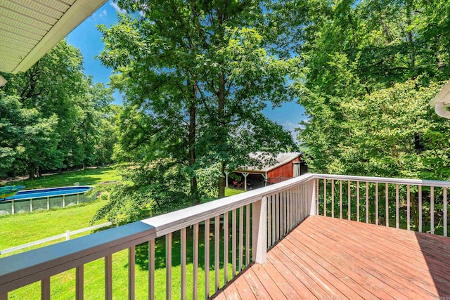 175 Appaloosa Trl, Hot Springs, AR 71909 - wooden deck with a yard, an outdoor pool, and an outbuilding