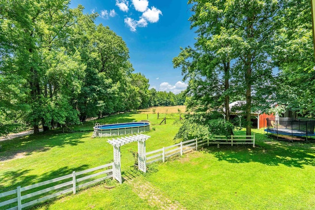 175 Appaloosa Trl, Hot Springs, AR 71909 - view of yard featuring a trampoline and a view of countryside