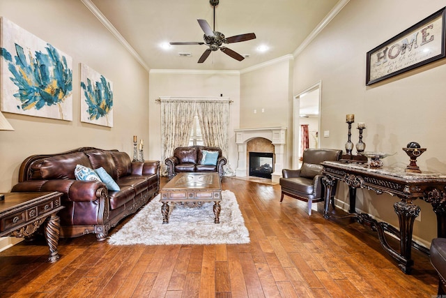 14 Longwell Loop, Little Rock, AR 72211 - living room with a ceiling fan, hardwood / wood-style flooring, crown molding, and a fireplace