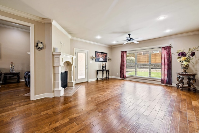 14 Longwell Loop, Little Rock, AR 72211 - unfurnished living room with a ceiling fan, wood-type flooring, a high end fireplace, recessed lighting, and ornamental molding