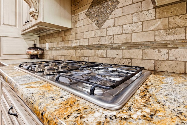 14 Longwell Loop, Little Rock, AR 72211 - kitchen view of light countertops, stainless steel gas cooktop, and backsplash