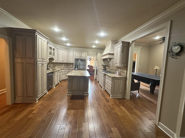 14 Longwell Loop, Little Rock, AR 72211 - kitchen with stainless steel appliances, dark wood-style floors, premium range hood, tasteful backsplash, and ornamental molding