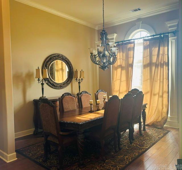 14 Longwell Loop, Little Rock, AR 72211 - dining area with a chandelier, hardwood / wood-style flooring, and ornamental molding