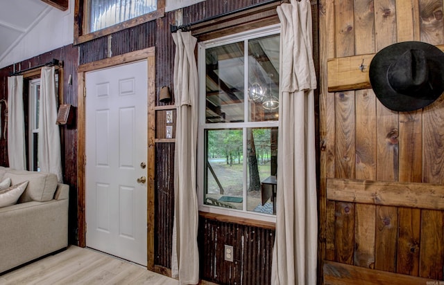 164 Roxie Ln, Greers Ferry, AR 72067 - foyer entrance featuring wooden walls and wood finished floors