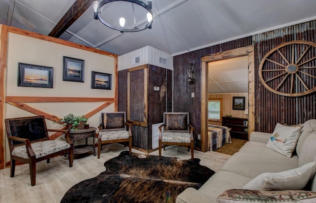 164 Roxie Ln, Greers Ferry, AR 72067 - living room featuring lofted ceiling, wood finished floors, and wooden walls