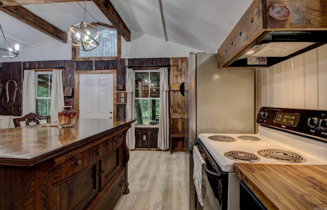 164 Roxie Ln, Greers Ferry, AR 72067 - kitchen with electric range oven, a chandelier, light wood-type flooring, wooden walls, and butcher block countertops