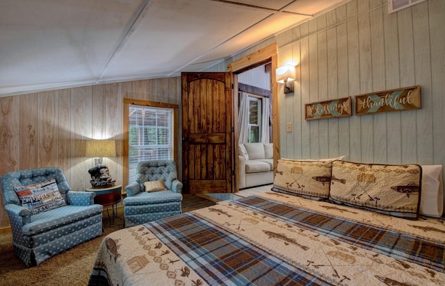 164 Roxie Ln, Greers Ferry, AR 72067 - bedroom with wood walls and lofted ceiling