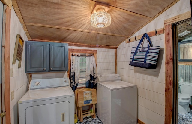 164 Roxie Ln, Greers Ferry, AR 72067 - washroom featuring washing machine and clothes dryer, cabinet space, and a chandelier