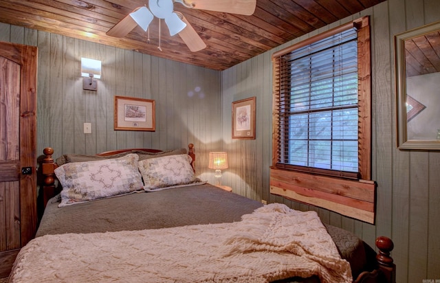 164 Roxie Ln, Greers Ferry, AR 72067 - bedroom featuring wooden ceiling, wooden walls, and a ceiling fan