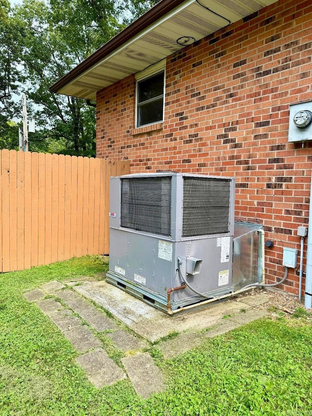 1711 Lonoke Rd, Mountain Home, AR 72653 - exterior view of a central AC unit and brick siding