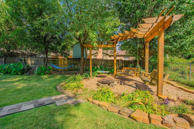 3 Sonata Trl, Little Rock, AR 72205 - fenced backyard with a fire pit and a pergola