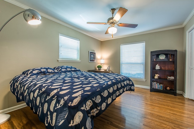 3 Sonata Trl, Little Rock, AR 72205 - bedroom featuring wood finished floors, ornamental molding, multiple windows, and a ceiling fan