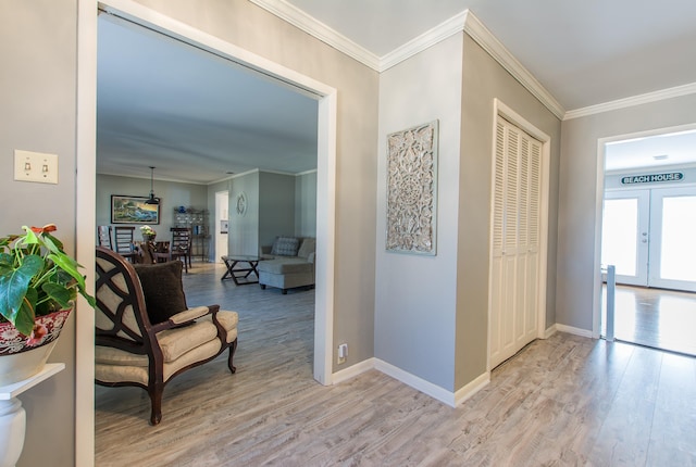 3 Sonata Trl, Little Rock, AR 72205 - corridor featuring light wood finished floors, crown molding, and french doors